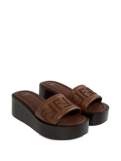Fendi Women Brown Slides With Wedge Heel And Ff Motiv On The Band In Leather Man In Braun