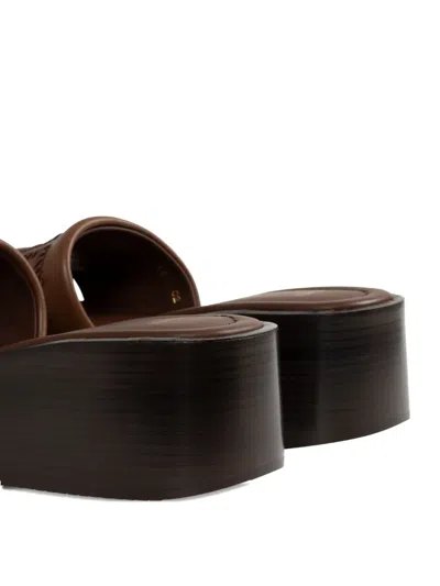 Fendi Women Brown Slides With Wedge Heel And Ff Motiv On The Band In Leather Man In Braun