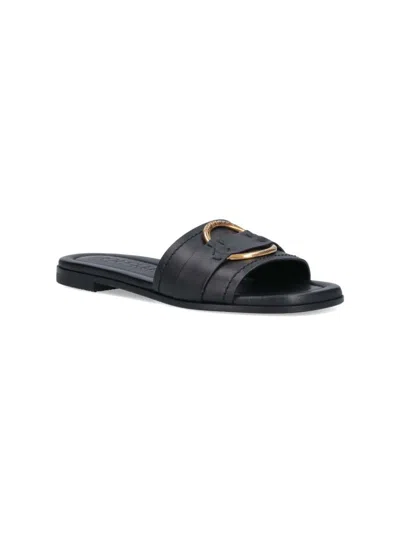 Moncler Black Slides With Distinctive Gold Emblem In Black