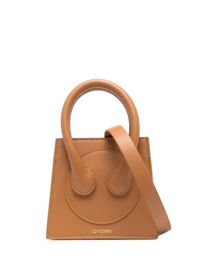 Az Factory Pre Az Factory X Ester Manas Small Cake Tote Bag In Camel