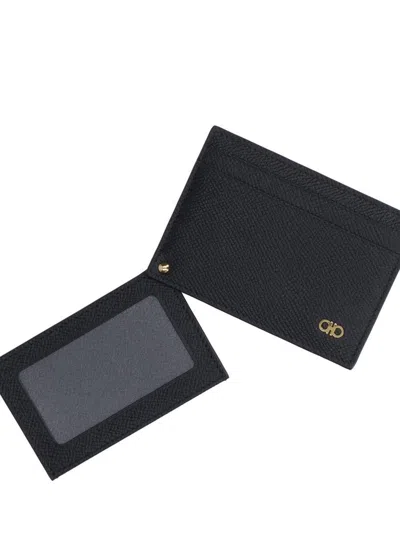 Ferragamo Gancini Bi-fold Wallet In Grained Leather In Black