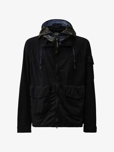 C.p. Company Blue Jacket With Explorer Hood And Adjustable Drawstring Waist In Tech Fabric Man In Black