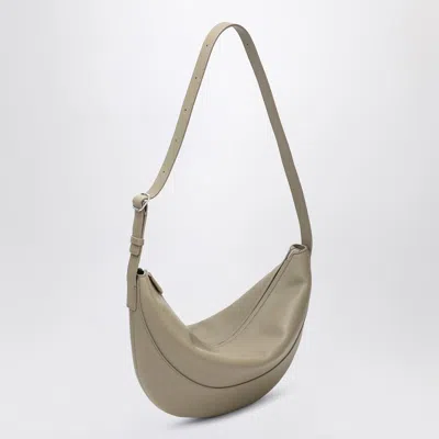 The Row Jouve Textured-leather Shoulder Bag In Beige