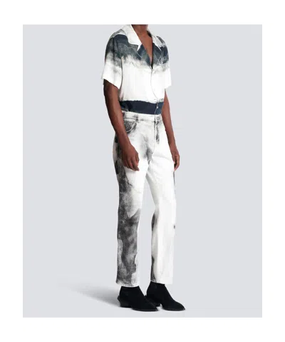 Balmain Regular-fit Denim Jeans With Moon Print In Gray
