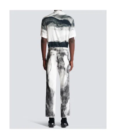 Balmain Regular-fit Denim Jeans With Moon Print In Gray