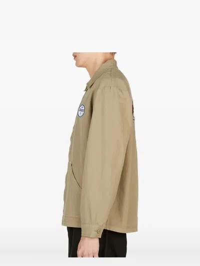 Liberaiders Cartoon-embroidery Jacket In Brown