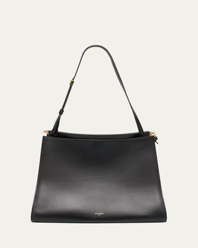 Alaïa Le Click Medium Curve Shoulder Bag In Glossy Leather In Noir