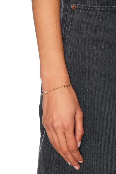 Saint Laurent Cassandre Heart Charm Bracelet In Gold