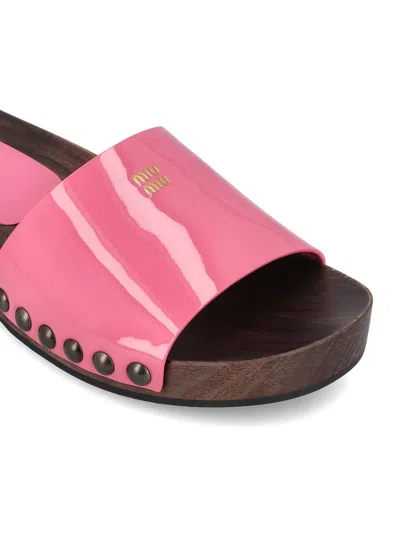 Miu Miu Leather Clogs With Studded Detail And Flat Sole In Begonia