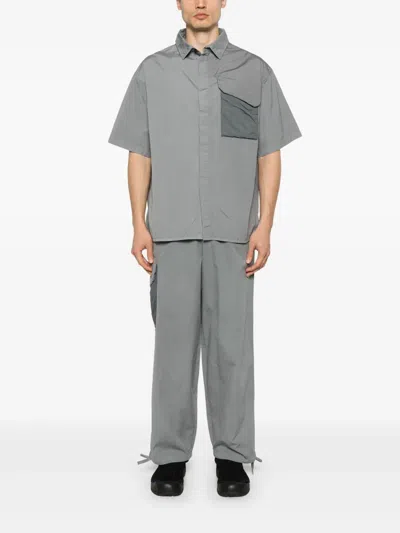 A-cold-wall* Logo-print Trousers In Grey