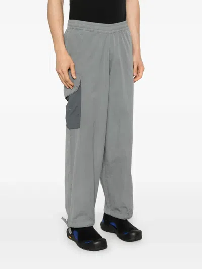 A-cold-wall* Logo-print Trousers In Grey