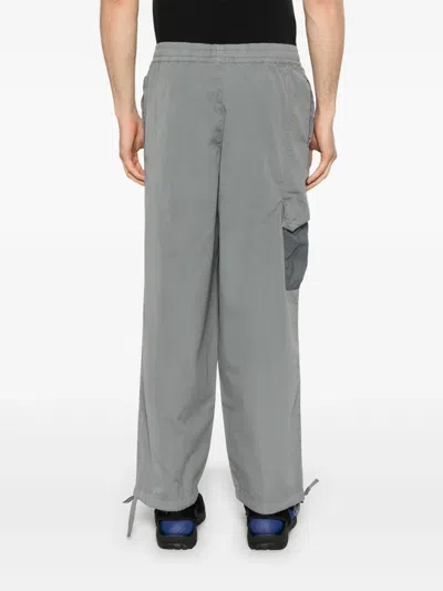 A-cold-wall* Logo-print Trousers In Grey