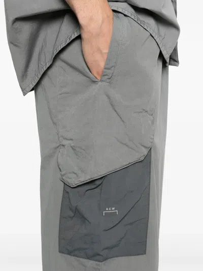 A-cold-wall* Logo-print Trousers In Grey