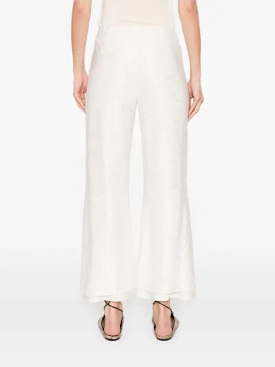 Jil Sander Flower-jacquard Trousers In Neutrals