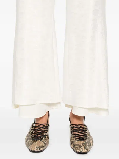 Jil Sander Flower-jacquard Trousers In Neutrals