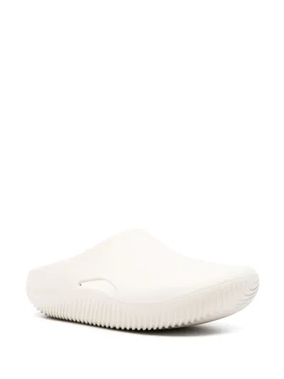 Crocs Logo-embossed Round-toe Slides In Neutral