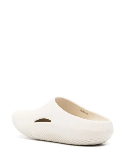 Crocs Logo-embossed Round-toe Slides In Neutral