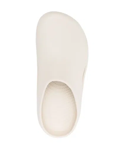 Crocs Logo-embossed Round-toe Slides In Neutral