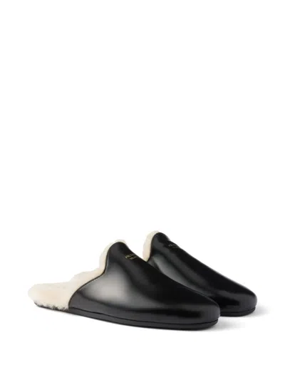 Prada Brushed Leather And Shearling Mules In Black