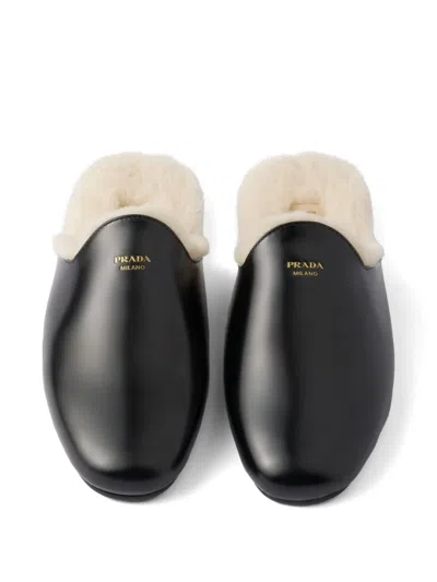 Prada Brushed Leather And Shearling Mules In Black