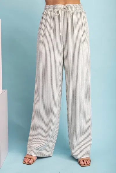 Eesome Pinstriped Drawstring Pants In White/black In Multi