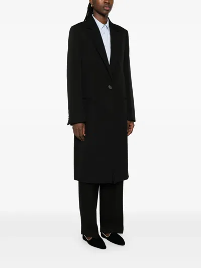 Totême Tailored Wool Coat Featuring Pockets In Black