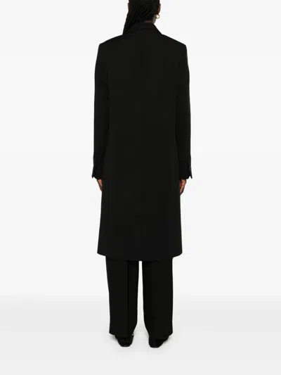 Totême Tailored Wool Coat Featuring Pockets In Black