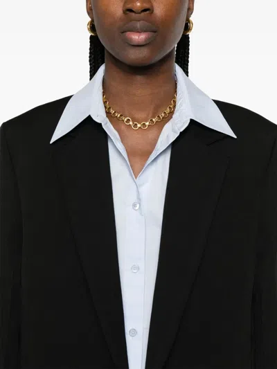 Totême Tailored Wool Coat Featuring Pockets In Black