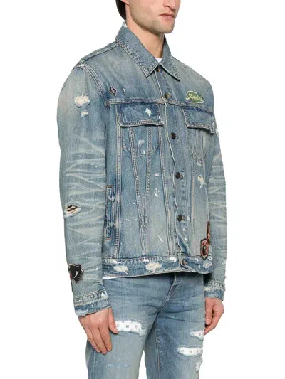 Amiri Vintage Pegasus Embellished Distressed Paint-splattered Denim Trucker Jacket In Azul