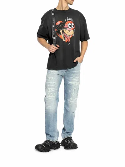 Amiri Clay Indigo Thrasher Lunar New Year Jeans In Azul