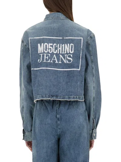 Moschino Pocketed Cropped Denim Jacket In Blue
