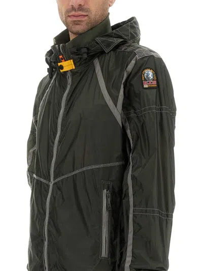 Parajumpers Edge Green Jacket With Logo Patch On The Sleeve And Shoulder Straps On The Back In Tech Fabric Man In Black