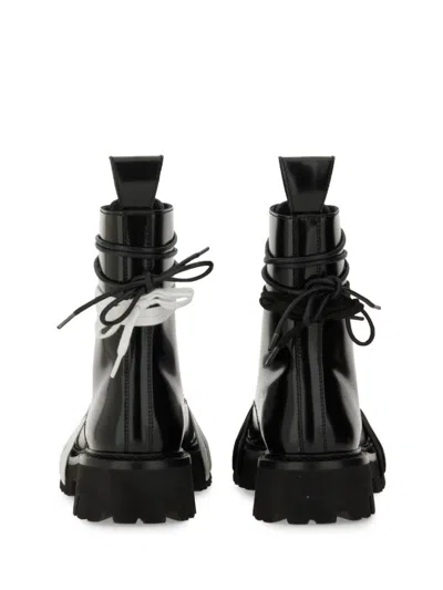 Moschino Glossy Leather Lace-up Boot With Sole In Black