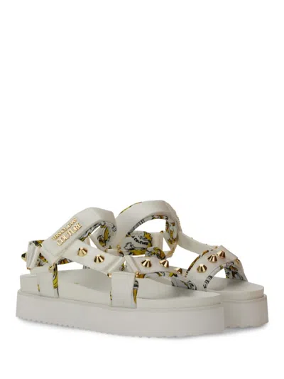 Versace Jeans Couture Sole Sandals With Decorative Logo Strap In Neutrals