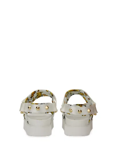 Versace Jeans Couture Sole Sandals With Decorative Logo Strap In Neutrals