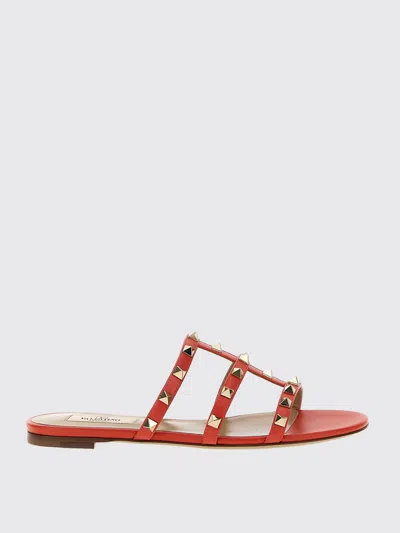 Valentino Rockstud Flat Sole Open Toe Sandals In Orange
