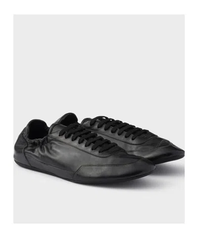 Prada Collapse Leather Sneakers In Black