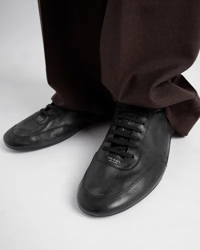 Prada Collapse Leather Sneakers In Black