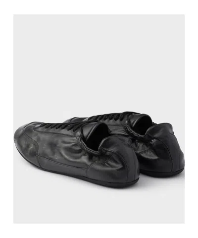 Prada Collapse Leather Sneakers In Black