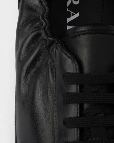 Prada Collapse Leather Sneakers In Black