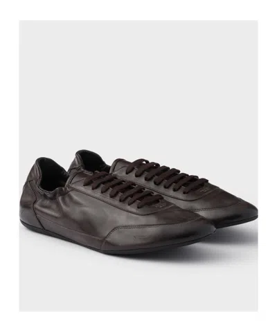 Prada Collapse Leather Sneakers In Black
