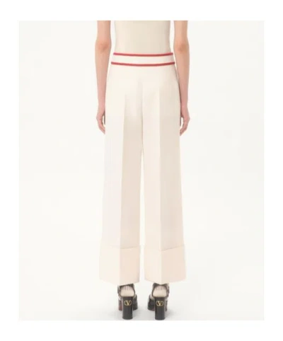Valentino Ivory Trousers With Gold V In Neutral