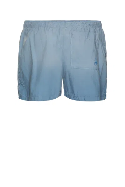 Jw Anderson Blue Logo Print Shorts In Light Blue