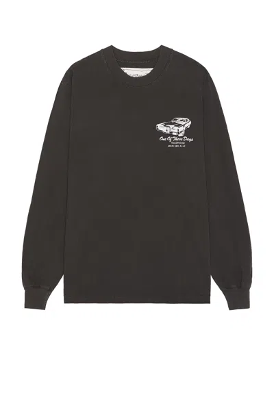 One Of These Days Tire Service Long Sleeve Tee In Washed Black