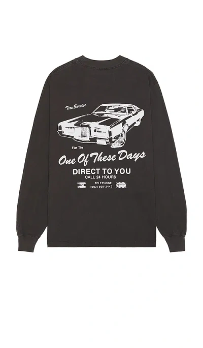 One Of These Days Tire Service Long Sleeve Tee In Washed Black