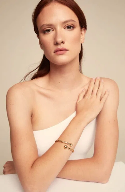 Unode50 18k Gold-plated Bangle Bracelet With Inner Spring In Gold