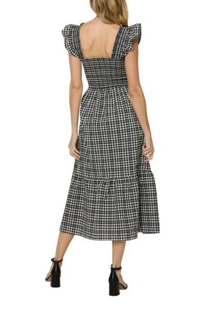 The Standard Stitch The Flounce Smocked Midi Dress In Black Checkerd