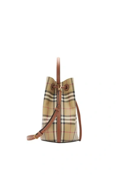 Burberry Drawstring Bucket Bag With Signature Plaid Pattern In Neutral