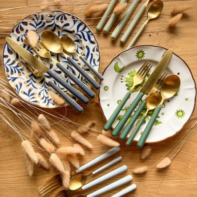 Mepra Fantasia Ice Gold Flatware  Set In Forest Green