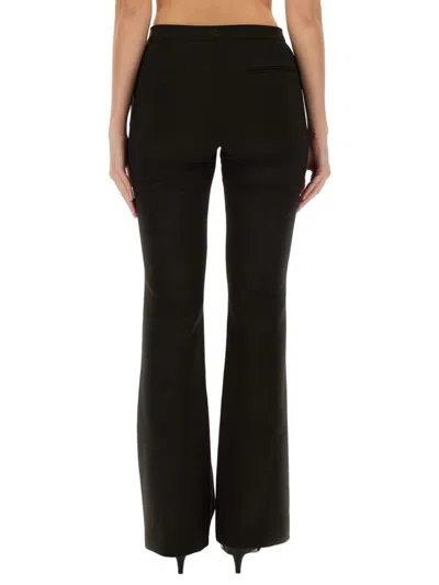 Courrèges Tailored Bootcut Pants In Technical Jersey In Black